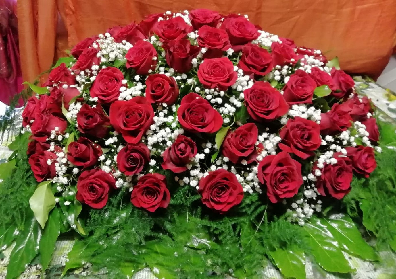 Cuscino funebre rose rosse