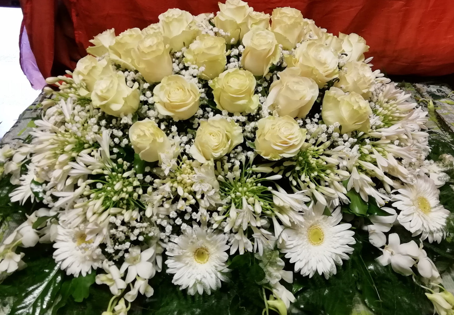 Cuscino funebre bianco